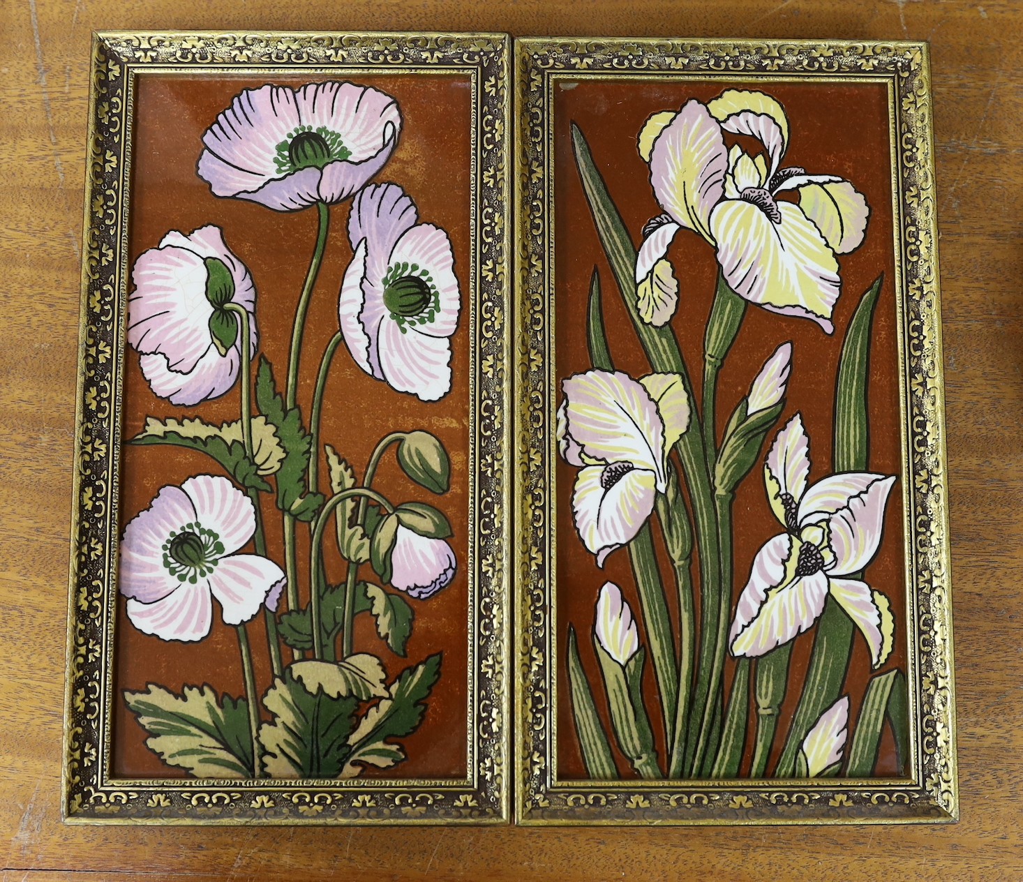 A pair of late 19th century Aesthetic pottery tile panels, 33 x 18cm